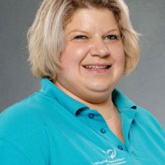 Porträtaufnahme der Mitarbeiterin der Krankenpflegestation Carina Giese. Carina Giese.